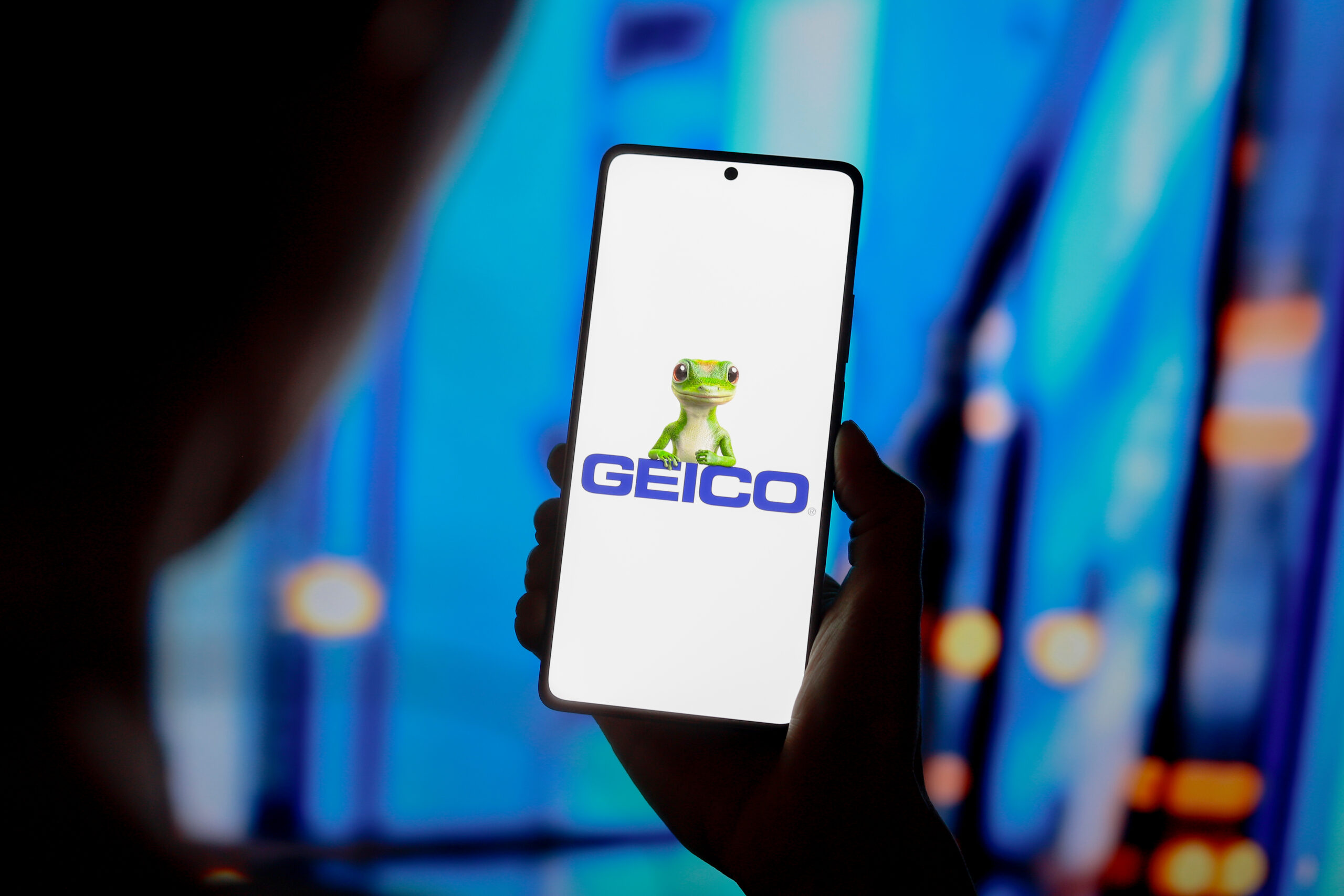 Geico logo on mobile phone